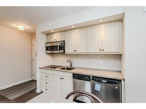 54-305-1235 Deerhurst Drive, Huntsville, ON - Indoor Photo Showing Kitchen With Double Sink