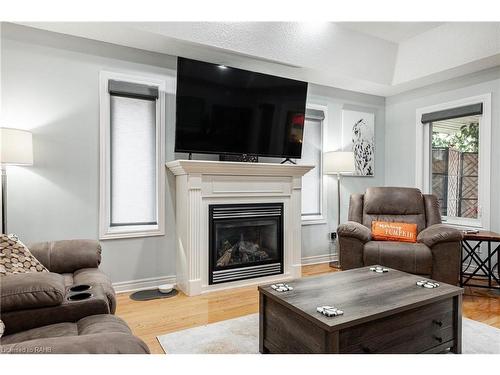 66 Abraham Drive, Stratford, ON - Indoor Photo Showing Living Room With Fireplace