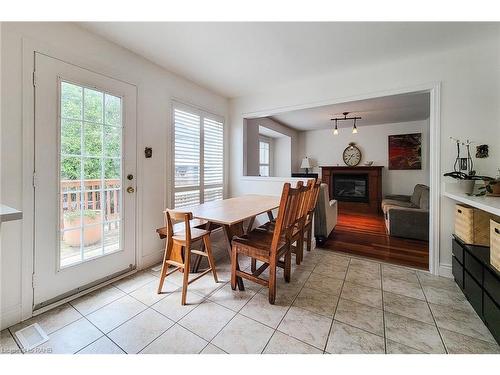 5147 Ravine Crescent, Burlington, ON - Indoor Photo Showing Dining Room With Fireplace