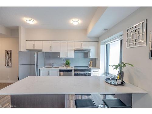 902-15 Queen Street S, Hamilton, ON - Indoor Photo Showing Kitchen With Double Sink