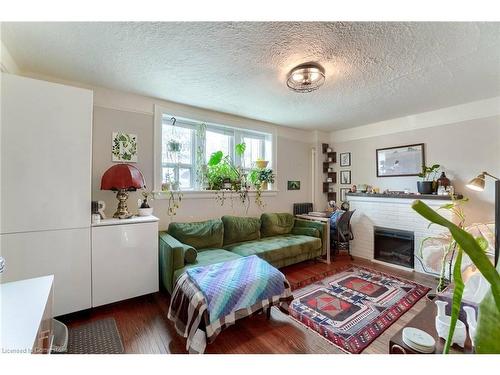 9-2 Vineland Avenue, Hamilton, ON - Indoor Photo Showing Living Room With Fireplace