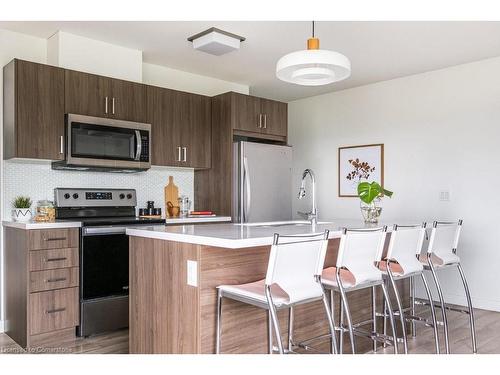 404-467 Charlton Avenue E, Hamilton, ON - Indoor Photo Showing Kitchen With Stainless Steel Kitchen