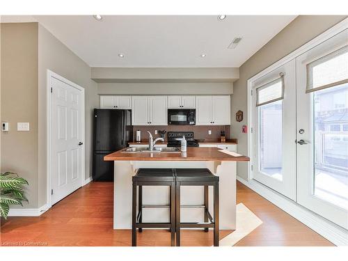 4-362 Plains Road E, Burlington, ON - Indoor Photo Showing Kitchen With Double Sink