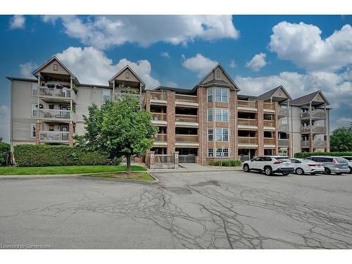 309-4003 Kilmer Drive, Burlington, ON - Outdoor With Balcony With Facade