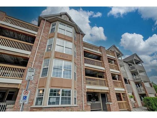 309-4003 Kilmer Drive, Burlington, ON - Outdoor With Balcony With Facade