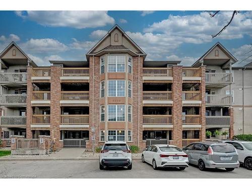 309-4003 Kilmer Drive, Burlington, ON - Outdoor With Balcony With Facade