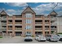 309-4003 Kilmer Drive, Burlington, ON  - Outdoor With Balcony With Facade 