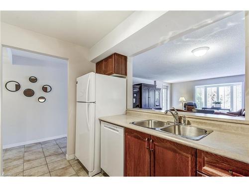 403B-216 Plains Road W, Burlington, ON - Indoor Photo Showing Kitchen With Double Sink