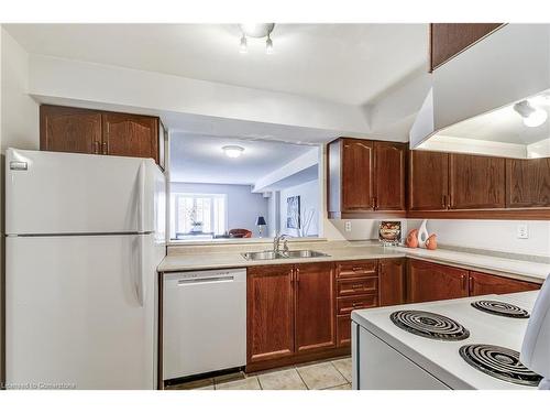 403B-216 Plains Road W, Burlington, ON - Indoor Photo Showing Kitchen With Double Sink