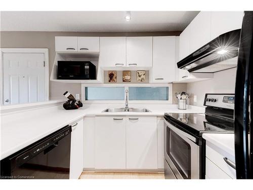 304-2040 Cleaver Avenue, Burlington, ON - Indoor Photo Showing Kitchen With Double Sink