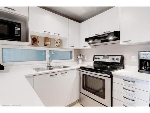 304-2040 Cleaver Avenue, Burlington, ON - Indoor Photo Showing Kitchen With Double Sink