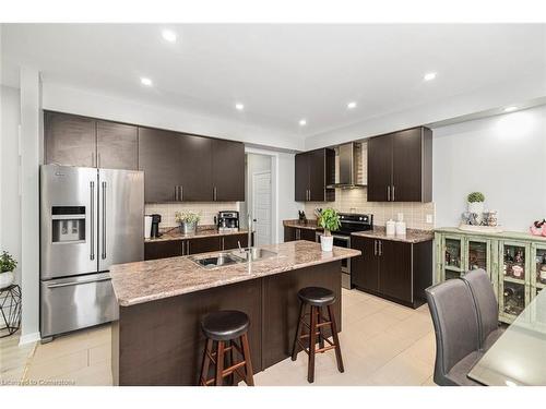 57 Larry Crescent, Caledonia, ON - Indoor Photo Showing Kitchen With Upgraded Kitchen