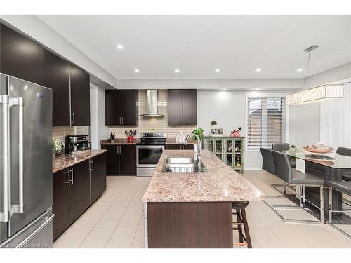 57 Larry Crescent, Caledonia, ON - Indoor Photo Showing Kitchen With Double Sink With Upgraded Kitchen