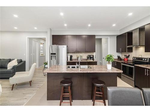 57 Larry Crescent, Caledonia, ON - Indoor Photo Showing Kitchen With Upgraded Kitchen