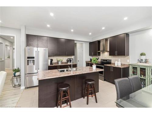 57 Larry Crescent, Caledonia, ON - Indoor Photo Showing Kitchen With Upgraded Kitchen