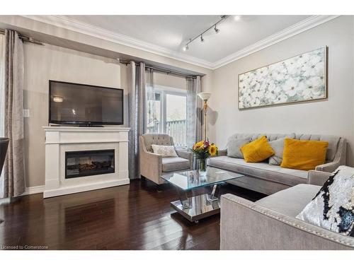 41-515 Winston Road, Grimsby, ON - Indoor Photo Showing Living Room With Fireplace