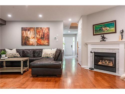 3-94 Huntingwood Avenue, Hamilton, ON - Indoor Photo Showing Living Room With Fireplace