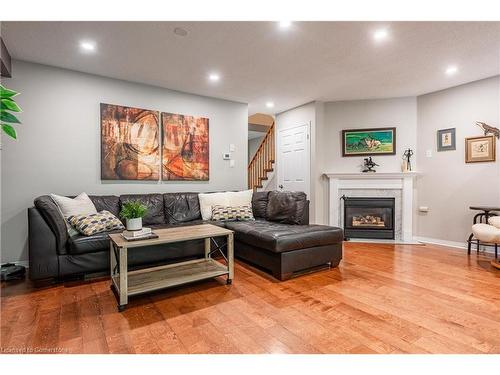 3-94 Huntingwood Avenue, Hamilton, ON - Indoor Photo Showing Living Room With Fireplace