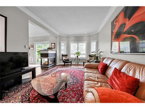 1151 Lockhart Road, Burlington, ON - Indoor Photo Showing Living Room With Fireplace