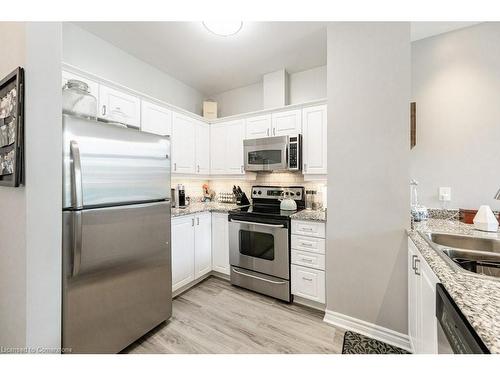 107-135 James Street S, Hamilton, ON - Indoor Photo Showing Kitchen With Double Sink