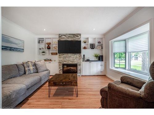 60 Cedar Crescent, New Dundee, ON - Indoor Photo Showing Living Room With Fireplace