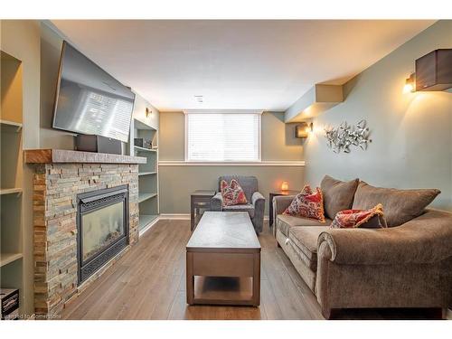 8855 Silverstar Court, Niagara Falls, ON - Indoor Photo Showing Living Room With Fireplace