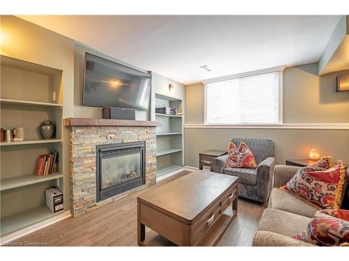 8855 Silverstar Court, Niagara Falls, ON - Indoor Photo Showing Living Room With Fireplace