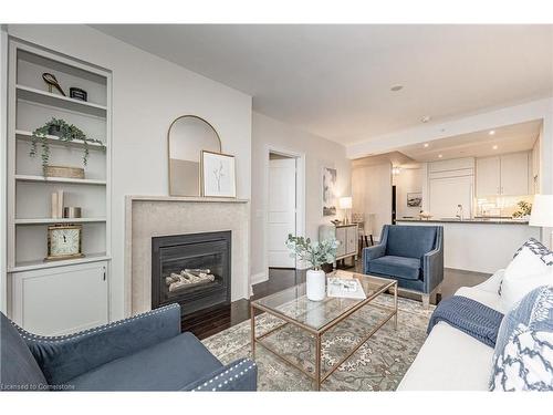 516-11 Bronte Road, Oakville, ON - Indoor Photo Showing Living Room With Fireplace