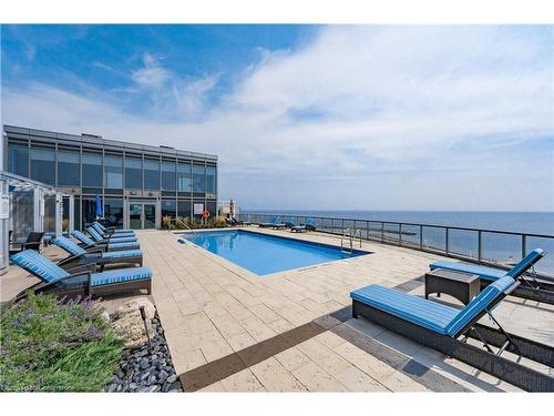 516-11 Bronte Road, Oakville, ON - Outdoor With In Ground Pool