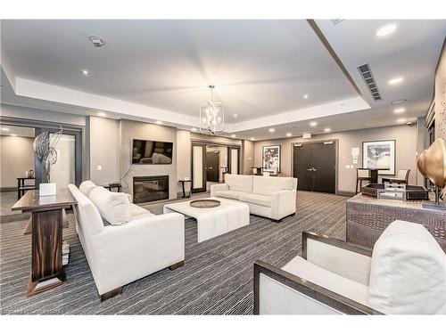 516-11 Bronte Road, Oakville, ON - Indoor Photo Showing Living Room With Fireplace