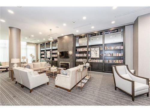 516-11 Bronte Road, Oakville, ON - Indoor Photo Showing Living Room With Fireplace