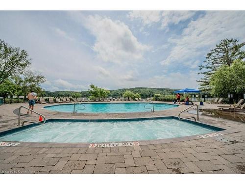 54-304-1235 Deerhurst Drive, Huntsville, ON - Outdoor With In Ground Pool