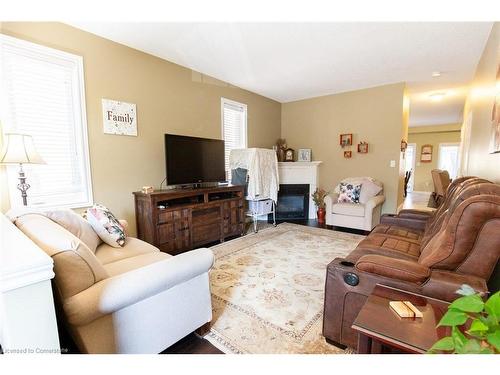 20 Springstead Avenue, Hamilton, ON - Indoor Photo Showing Living Room With Fireplace