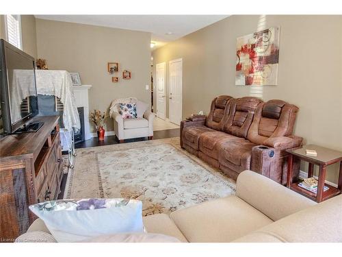 20 Springstead Avenue, Hamilton, ON - Indoor Photo Showing Living Room With Fireplace