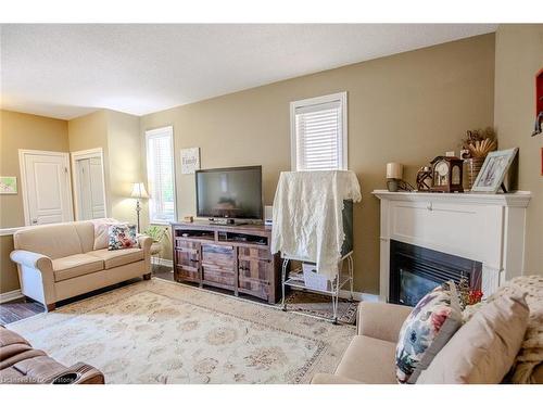 20 Springstead Avenue, Hamilton, ON - Indoor Photo Showing Living Room With Fireplace