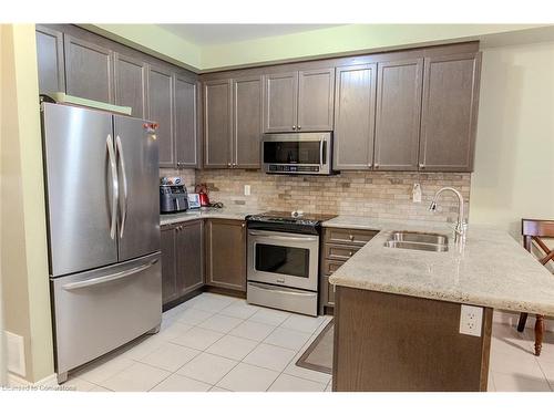 20 Springstead Avenue, Hamilton, ON - Indoor Photo Showing Kitchen With Stainless Steel Kitchen With Double Sink With Upgraded Kitchen