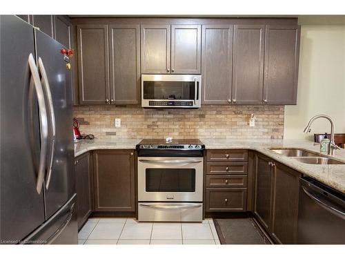 20 Springstead Avenue, Hamilton, ON - Indoor Photo Showing Kitchen With Stainless Steel Kitchen With Double Sink With Upgraded Kitchen