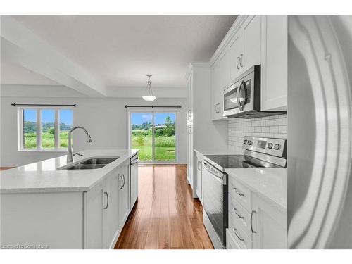 1318 Caen Avenue, Woodstock, ON - Indoor Photo Showing Kitchen With Double Sink With Upgraded Kitchen