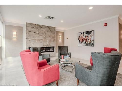 503-5090 Pinedale Avenue, Burlington, ON - Indoor Photo Showing Living Room With Fireplace