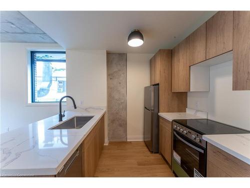 402-11 Robert Street, Hamilton, ON - Indoor Photo Showing Kitchen With Stainless Steel Kitchen