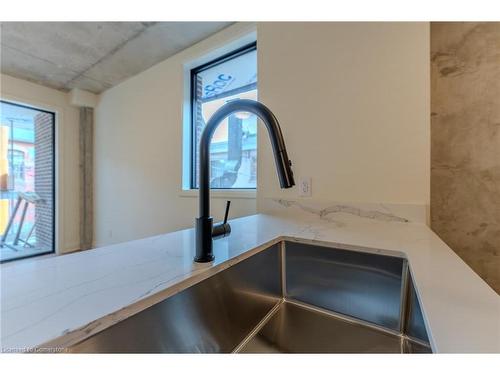 402-11 Robert Street, Hamilton, ON - Indoor Photo Showing Kitchen With Double Sink