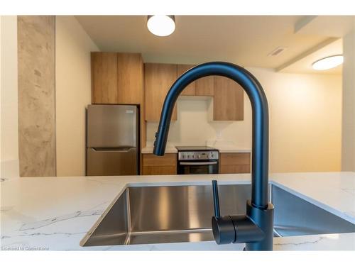 402-11 Robert Street, Hamilton, ON - Indoor Photo Showing Kitchen With Stainless Steel Kitchen