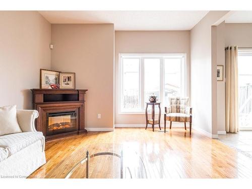 522 Stonehenge Drive, Ancaster, ON - Indoor Photo Showing Living Room With Fireplace