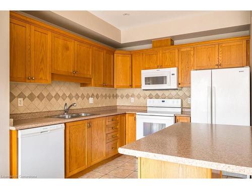 522 Stonehenge Drive, Ancaster, ON - Indoor Photo Showing Kitchen With Double Sink