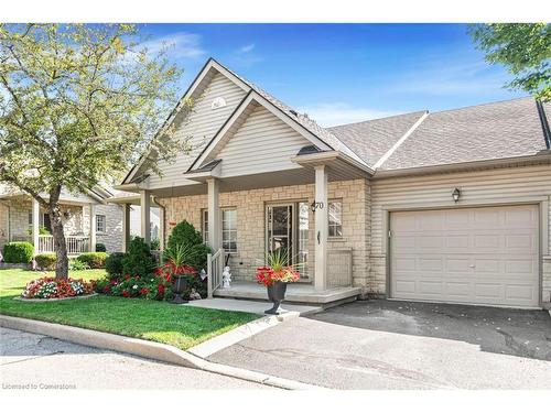 70-34 Southbrook Drive, Binbrook, ON - Outdoor With Facade