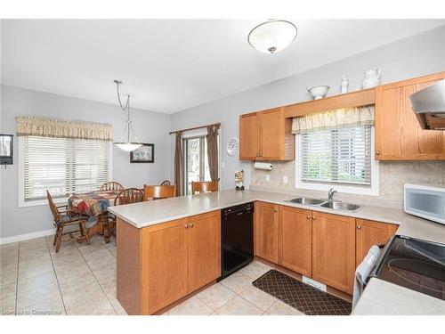 70-34 Southbrook Drive, Binbrook, ON - Indoor Photo Showing Kitchen With Double Sink