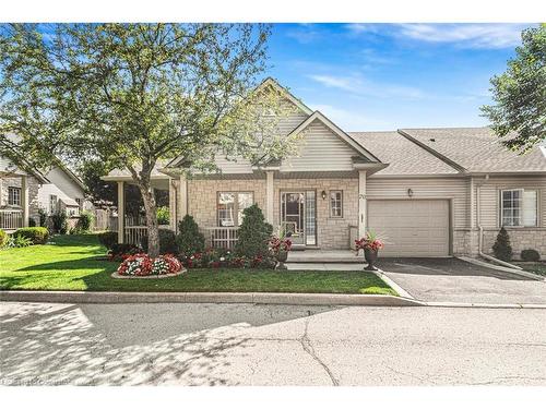 70-34 Southbrook Drive, Binbrook, ON - Outdoor With Facade