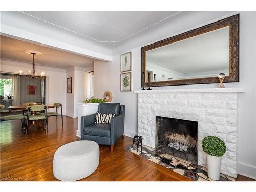 60 Inverness Avenue W, Hamilton, ON - Indoor Photo Showing Living Room With Fireplace