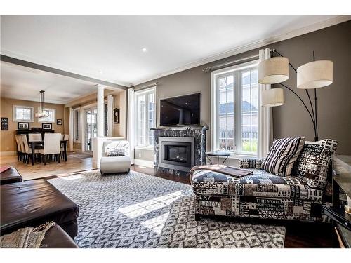 2062 Gordie Tapp Crescent, Burlington, ON - Indoor Photo Showing Living Room With Fireplace