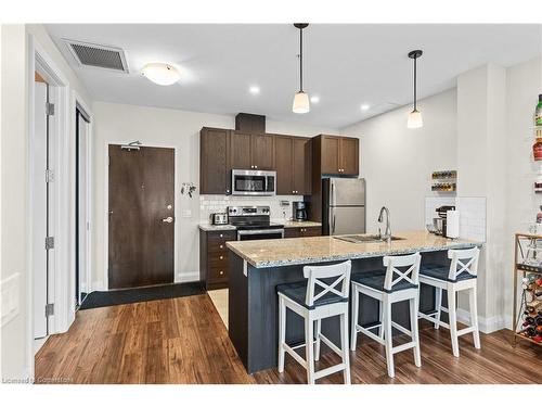 310-118 King Street E, Hamilton, ON - Indoor Photo Showing Kitchen With Double Sink With Upgraded Kitchen